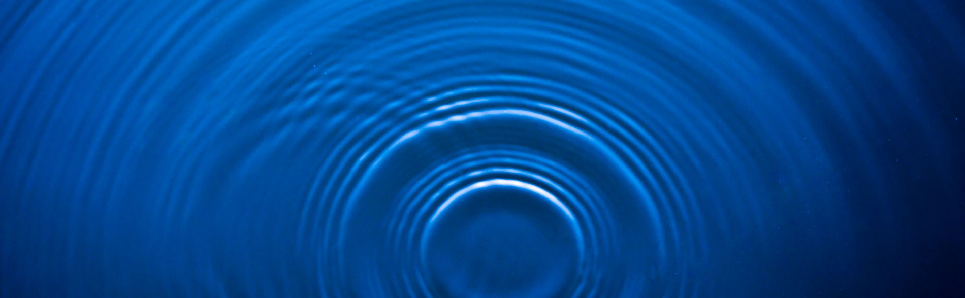 Blue ripples in a pond